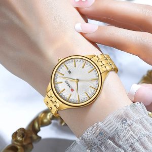 ساعت مچی عقربه‌ای زنانه کورن مدل 9099GWG - Image 3